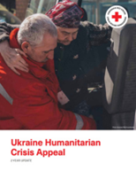 A Red Cross employee helping a woman getting into a car in Ukraine